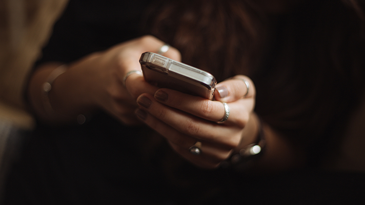 woman holding a cellphone