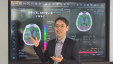 JLK CEO Dong-Min Kim showcasing their stroke AI solution