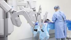 Technician preparing surgical robot 