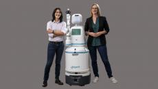 Diligent Robotics cofounders Andrea Thomaz and Vivian Chu with the Moxi robot