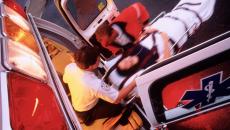 EMTs loading a patient into an ambulance