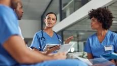 Healthcare providers sitting in a circle