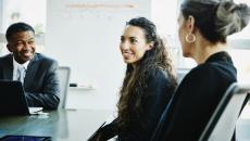 Professionals at a conference table