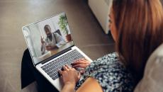 Patient consulting with a health coach on their laptop