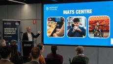 A presenter introducing the new MATS Centre during its launch