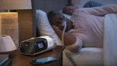 Person sleeping using the ResMed AirSense 11