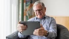 Patient interacting via tablet