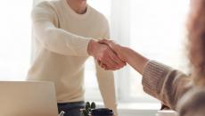 two people shaking hands