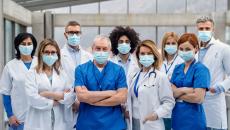 Healthcare providers standing together in a hospital setting