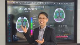 JLK CEO Dong-Min Kim showcasing their stroke AI solution