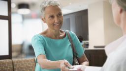 Patient discussing prescription with healthcare professional 