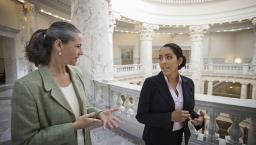 Two legislators talking in the U.S. Capitol