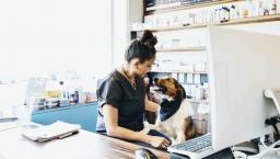 Pharmacist with a dog