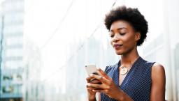 Patient looking at medical records on smart phone