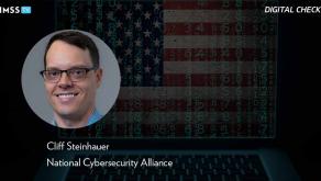 Cliff Steinhauer at the National Cybersecurity Alliance_Laptop with American flag and binary code Photo by Smederevac/iStock/Getty Images Plus