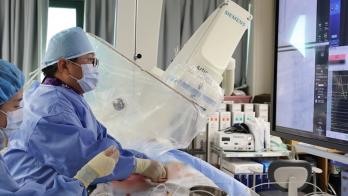 A surgeon conducting a stent procedure