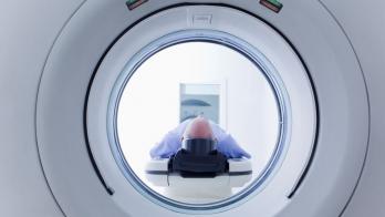 Person in a diagnostic imaging machine