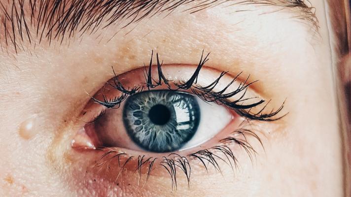 Person's face close up with a focus on their eye