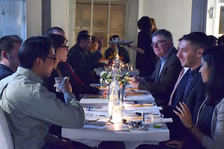 Junto Health members gather at a dinner.